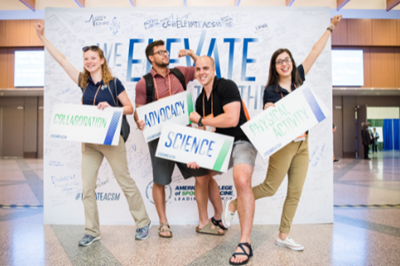 students in front of the "elevate" sign at ACSM annual meeting 2018