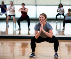 group exercise class squats
